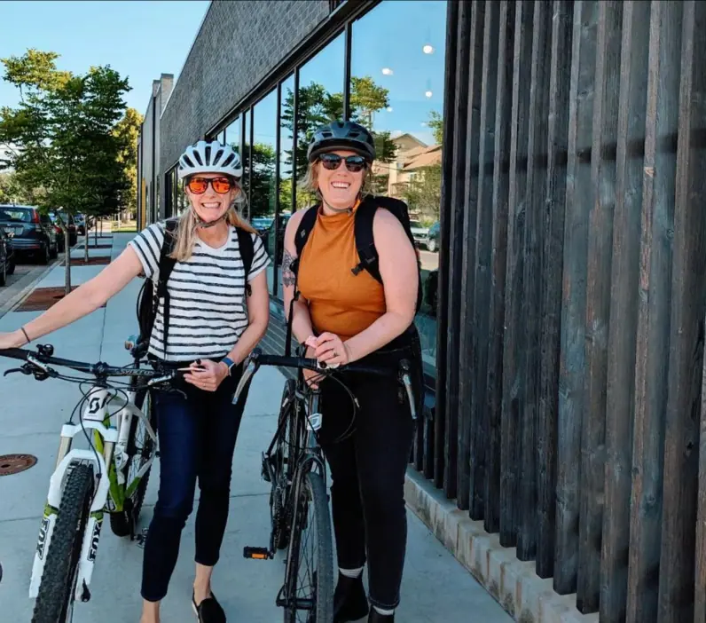 two women with cycle